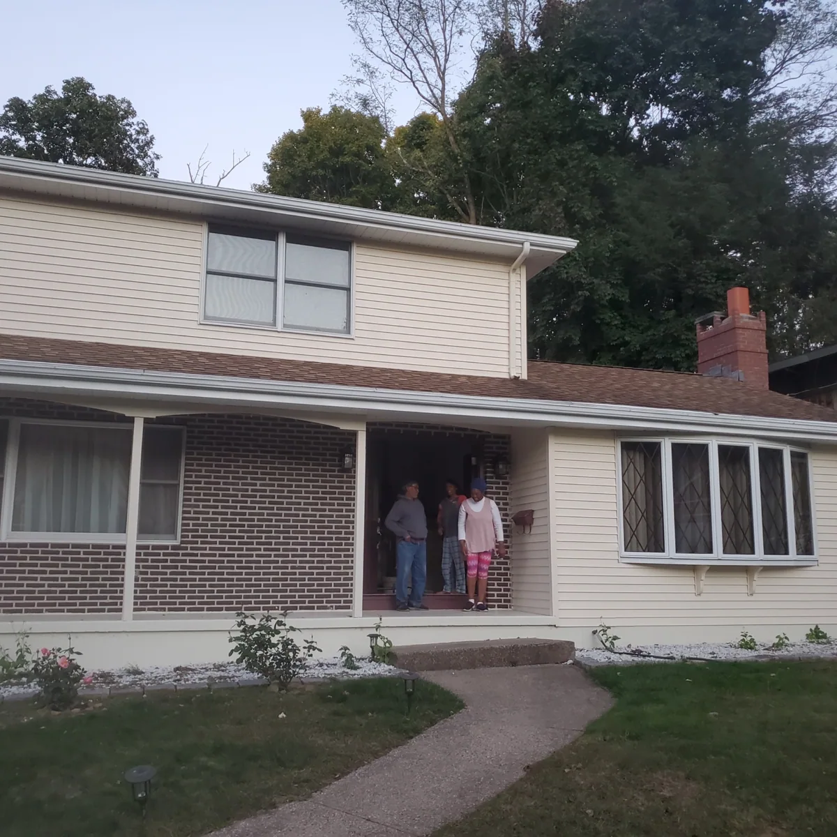 Residential exterior with painted siding and trim